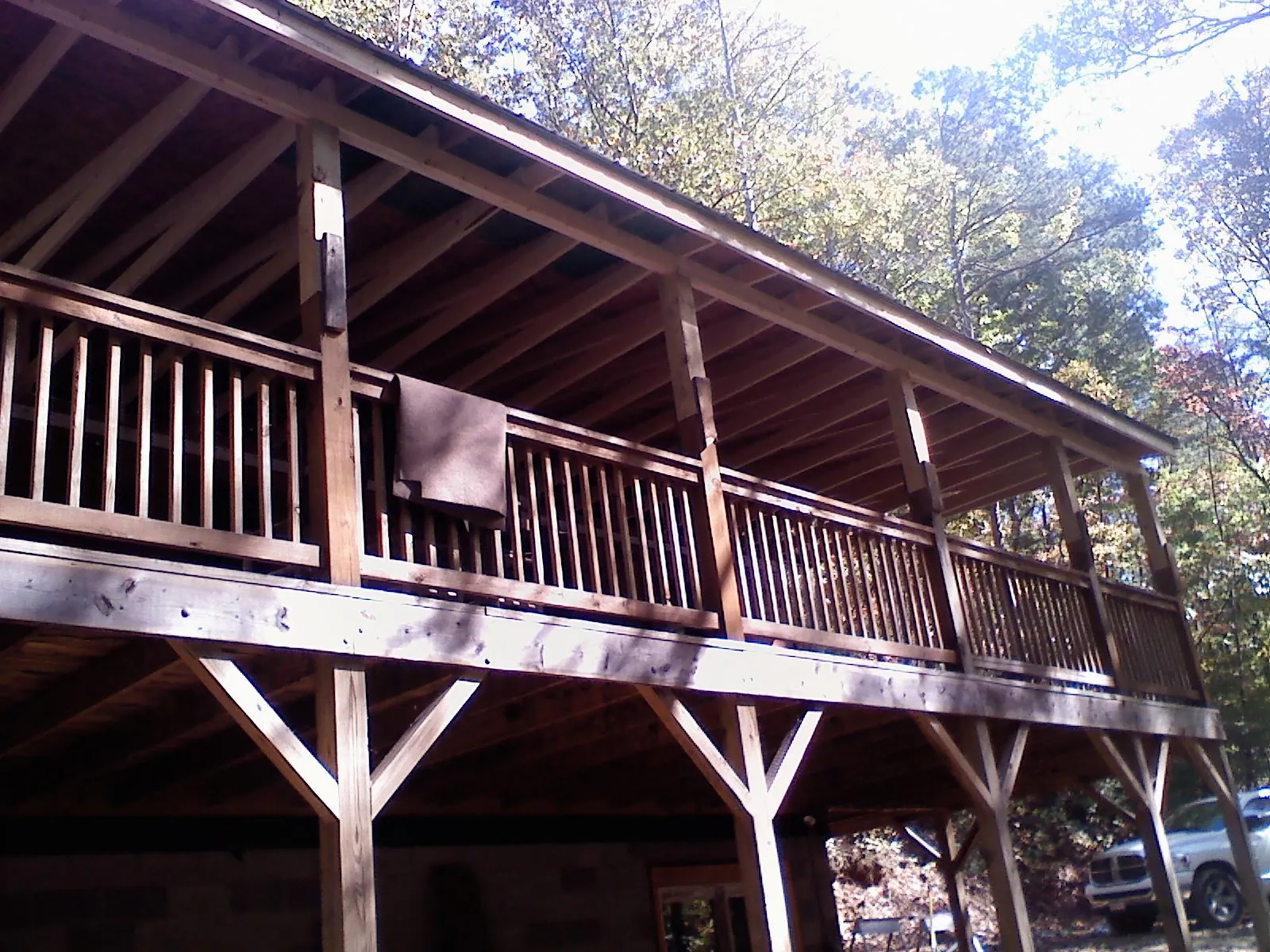 Timber framing under a new elevated porch and deck — Roof Leak Repair in Surfside by Roofing Brothers